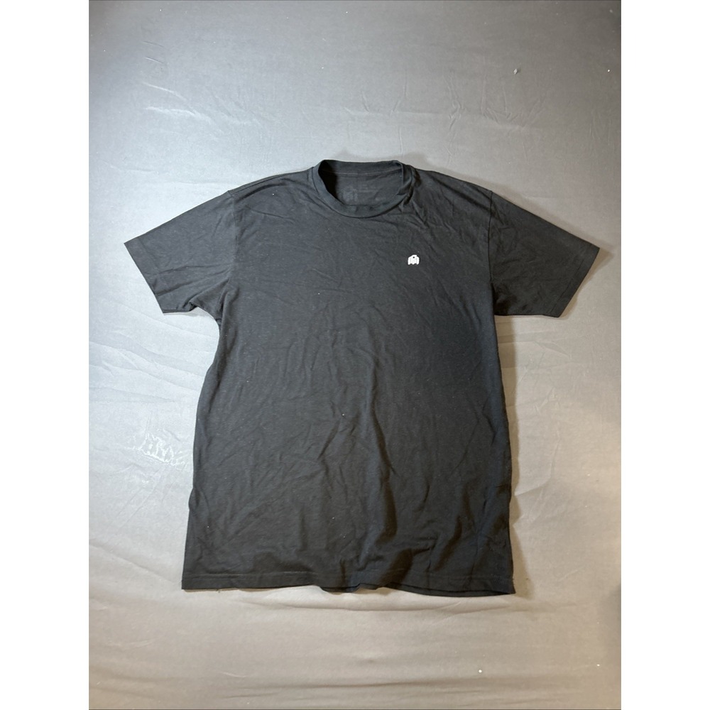 black crew neck t-shirt featuring a small white logo XL